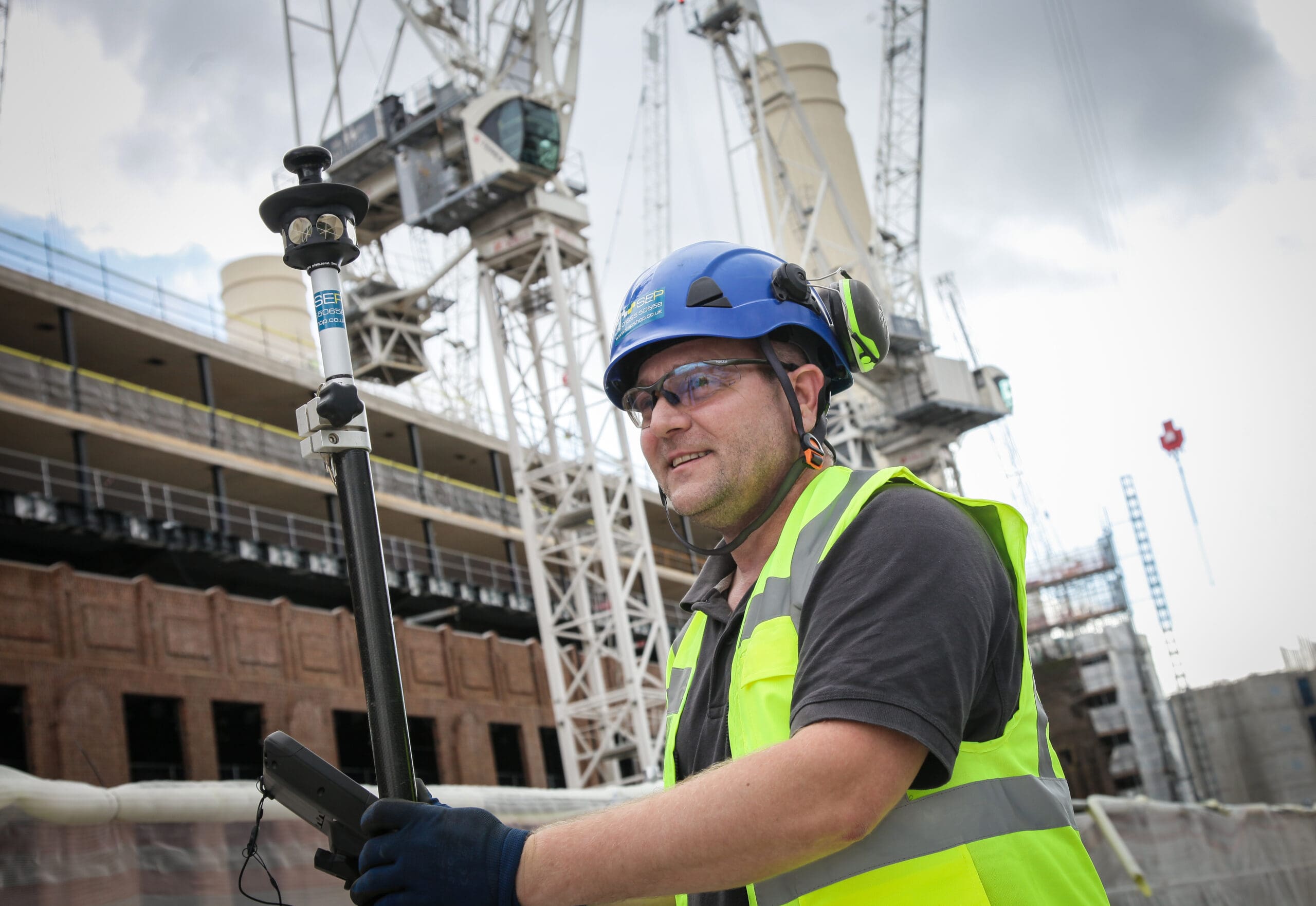 Setting out engineer in Amersham marking site layout